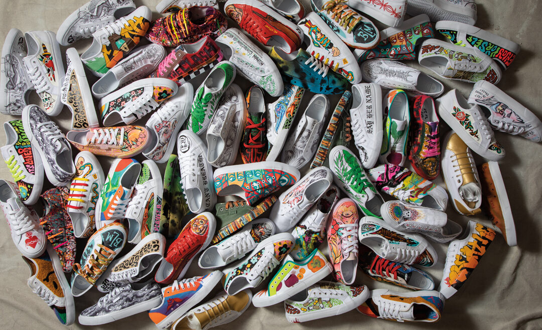 Pile of custom-painted shoes